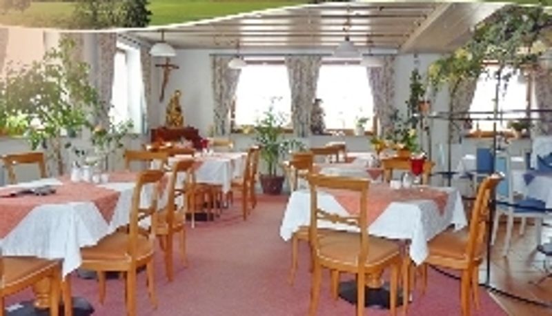 Salle de petit-déjeuner dans le restaurant - Christina Landhotel