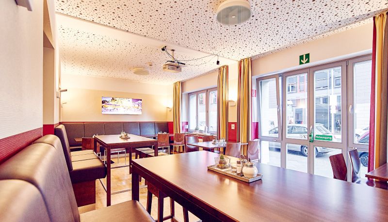 Sala prima colazione all'interno del ristorante - DJH Gästehaus Bermuda3Eck