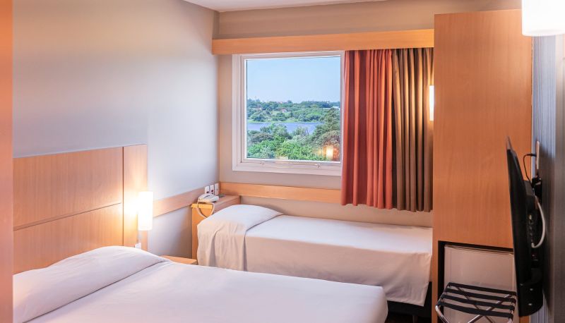 Dreibettzimmer - HUS Hotel Dourados