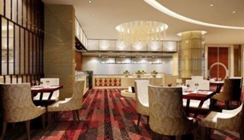 Frühstücksraum innerhalb des Restaurants - Minshan Hotel