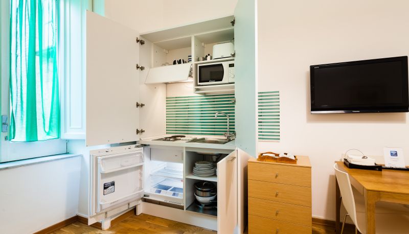 Zona de cocina en la habitación - Corso Italia Suites