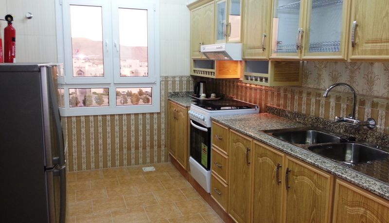 Küchenbereich im Zimmer - Nizwa Hotel Apartments