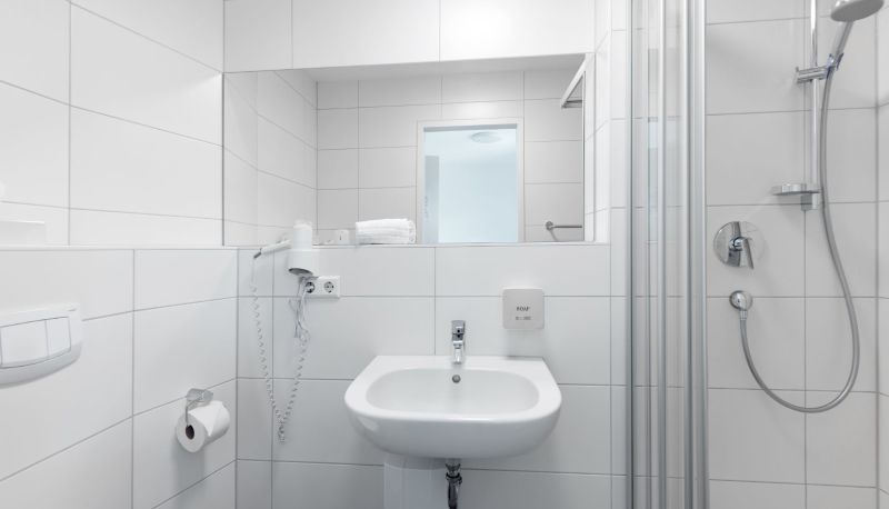 Badezimmer - Hotel Garni am Olgaeck