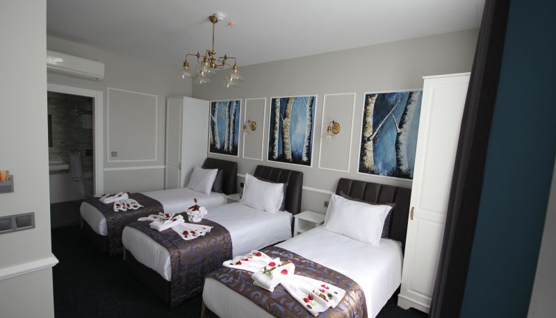 Habitación triple - HOTEL NAUMPAŞA KONAĞI