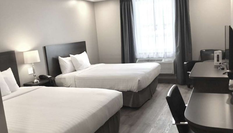 Chambre - Villa Inn & Suites SureStay Collection by Best Western