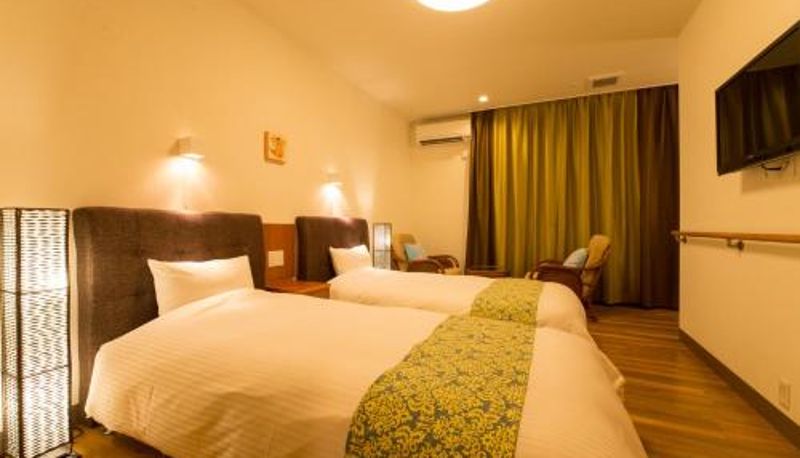 Zimmer - Sun Green Resort Hotel Ishigaki