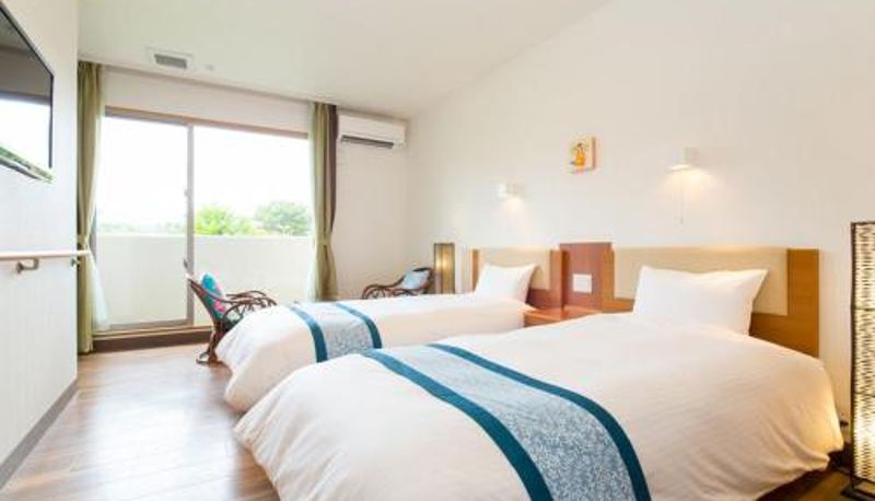Chambre - Sun Green Resort Hotel Ishigaki