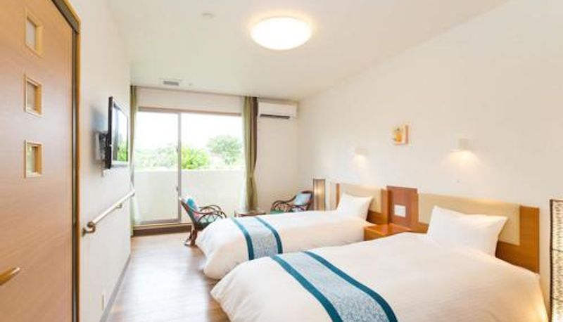 Chambre - Sun Green Resort Hotel Ishigaki