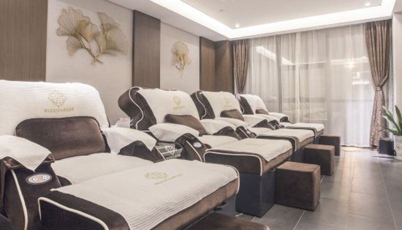 Zona de bienestar y gimnasio - King Fond Hotel