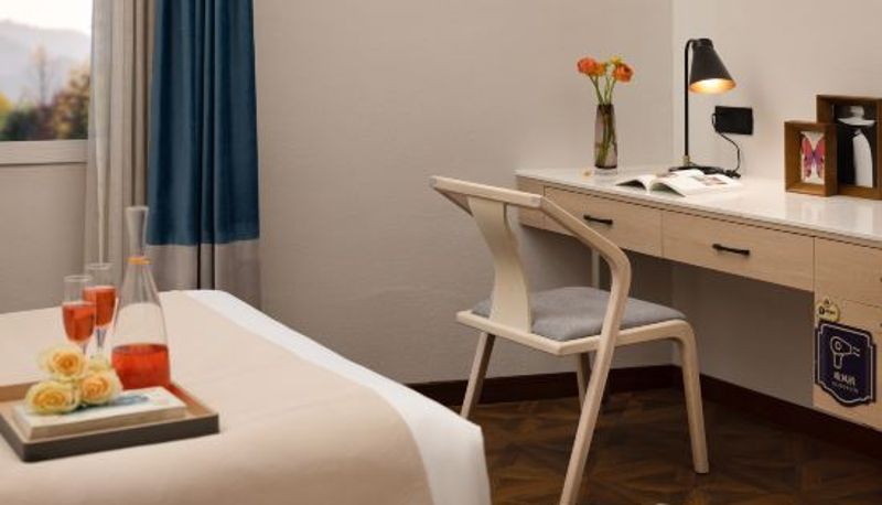 Habitación - Huayi Brothers  Town Castle Hotel