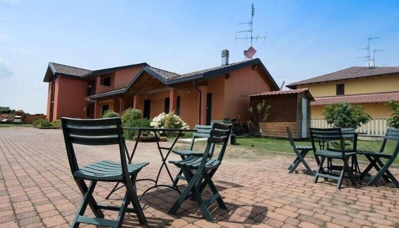 Buitenruimte van het hotel - Residence I Cigni