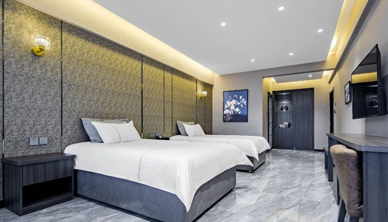 Zimmer - Magnotel Dandong Tianci Vigor City Jinshan Street Hotel