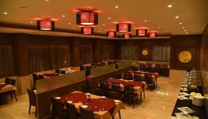 Frühstücksraum innerhalb des Restaurants - Rathna Residency