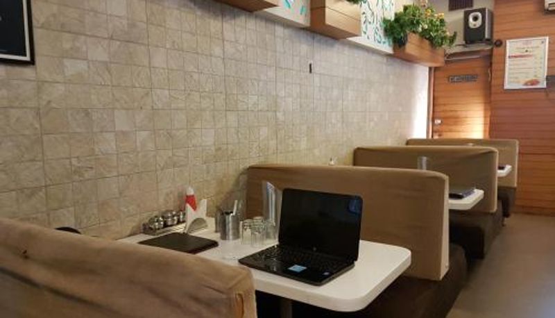 Frühstücksraum innerhalb des Restaurants - Hotel Swagat