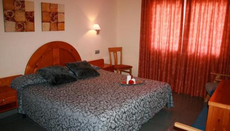 Room - Hotel El Pinche de Oro 3000