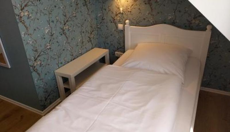 Quarto - Das Gartenhaus