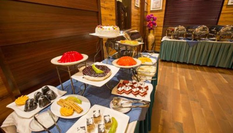 レストラン内の朝食ルーム - Luxury Hotel Apartments