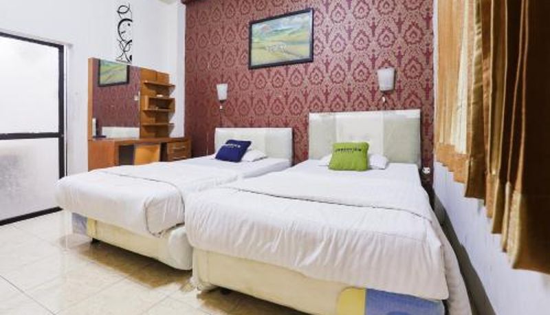 Zimmer - Urbanview Hotel Kanca Banjarmasin by RedDoorz