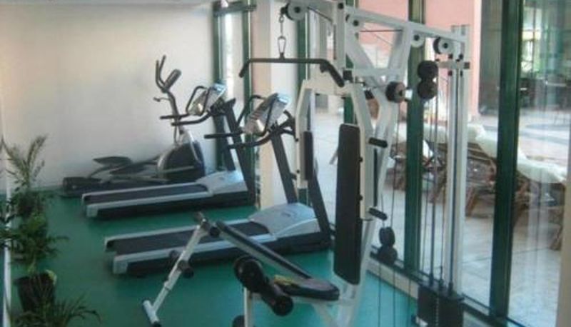 Zona de bienestar y gimnasio - Pollo Resort