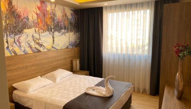 Camera - Golden World Suite Hotel