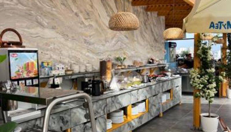 Sala de desayunos dentro del restaurante - Ilio Boutique Hotel