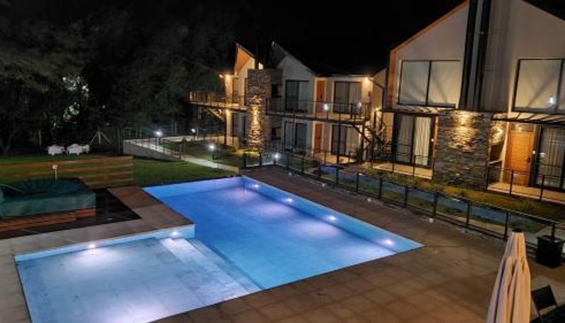 Piscina - El Nogal Apart Hotel