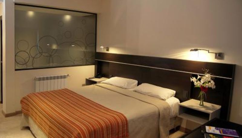 Pokój trzyosobowy - Altos De Merlo Suites