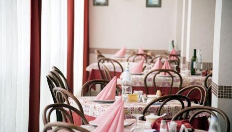 Ontbijtzaal in het restaurant - Hotel Seven