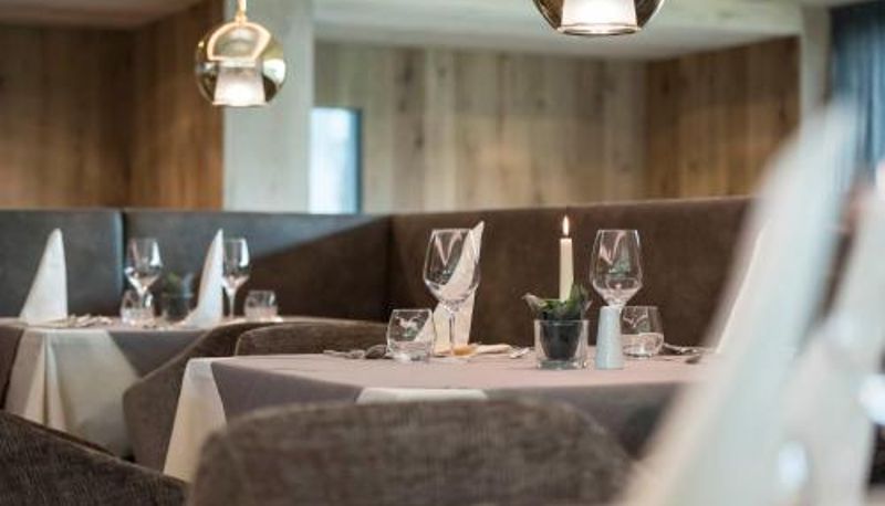 Salle de petit-déjeuner dans le restaurant - Hotel Madonna