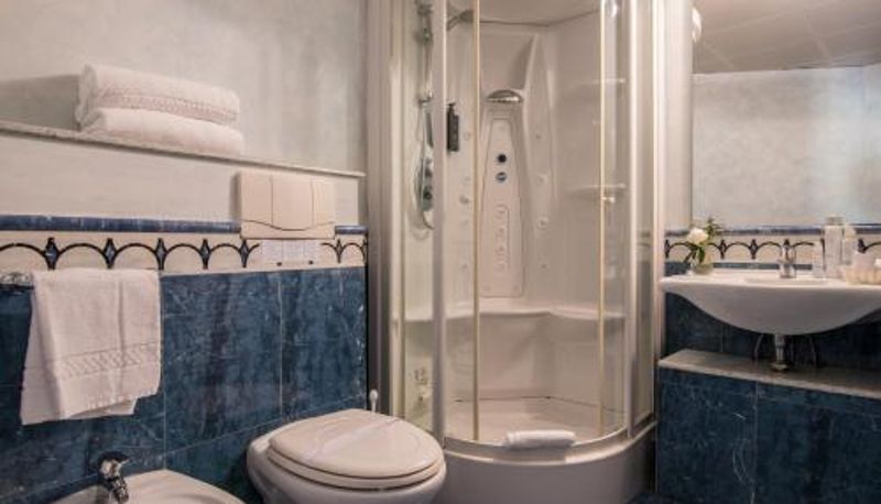 Badkamer - AHG Golf Hotel Porta Del Sole