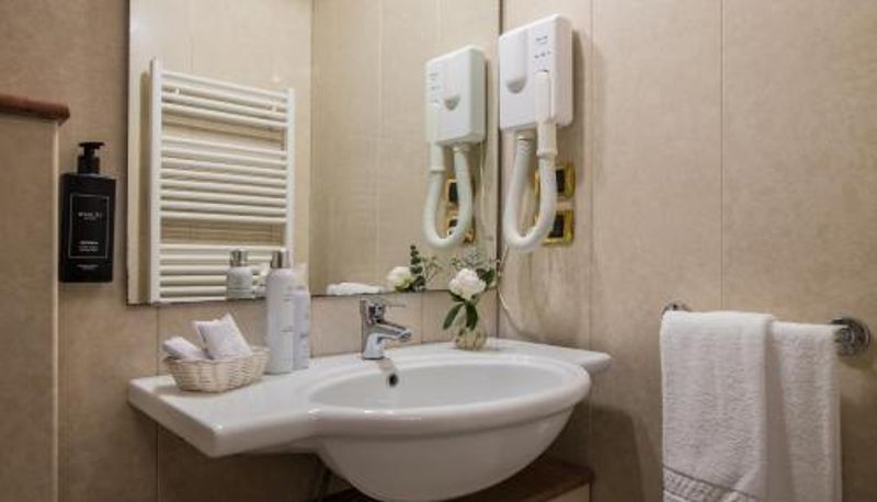 Badkamer - AHG Golf Hotel Porta Del Sole