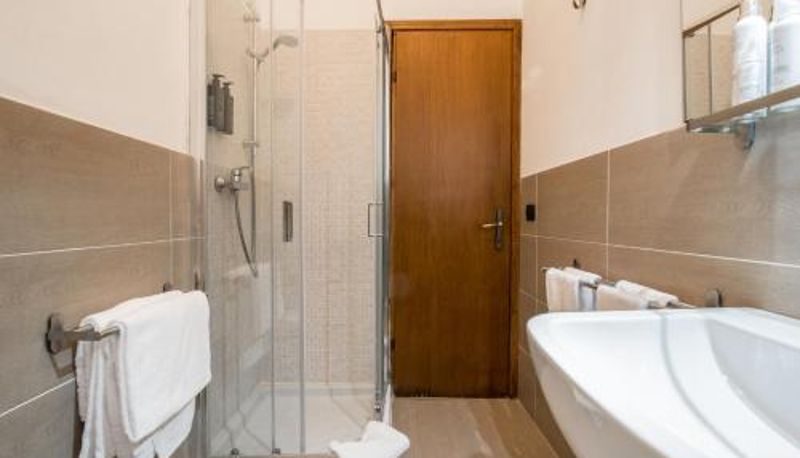 Badkamer - AHG Golf Hotel Porta Del Sole