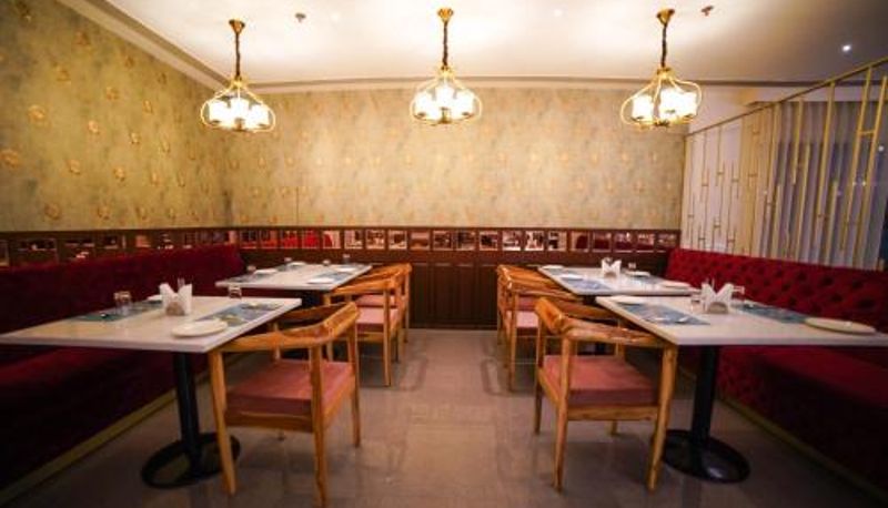 Sala de pequeno-almoço no restaurante - Hotel Le Amritam