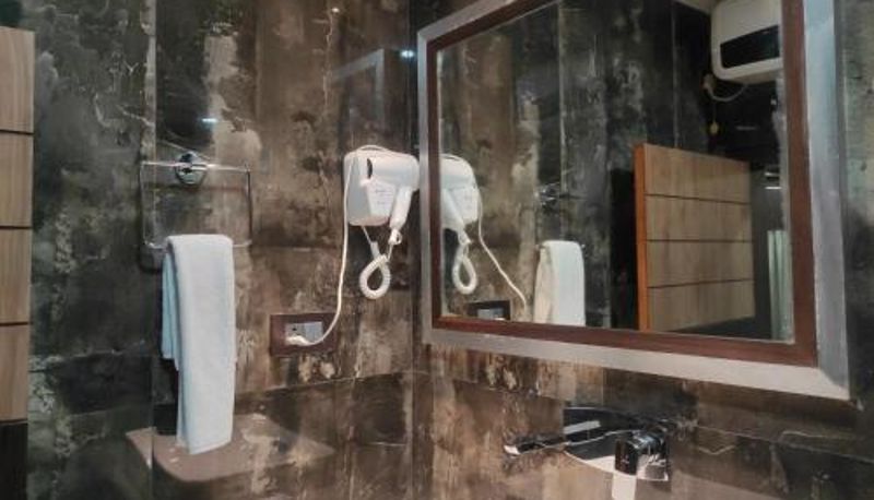Cuarto de baño - Hotel Aavas Inn