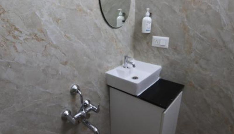 Badezimmer - Apex Inn Prime Hebbal