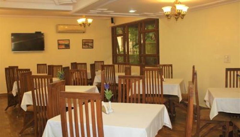 Salle de petit-déjeuner dans le restaurant - Sonikas Holiday Homes (Studio)