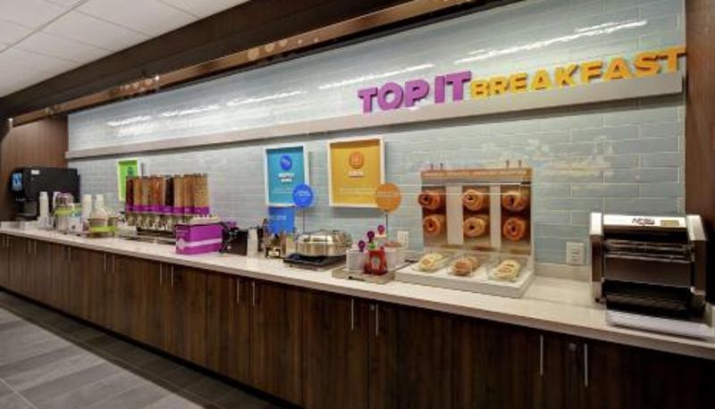 Breakfast room within the restaurant - Co Tru By Hilton Denver South Park Meadows