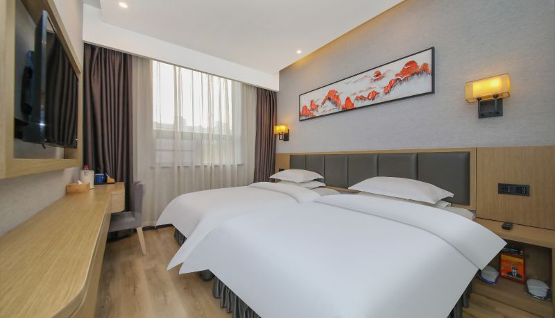 Zimmer - Xingcheng Wuhan Shouyi Road Subway Station Hotel