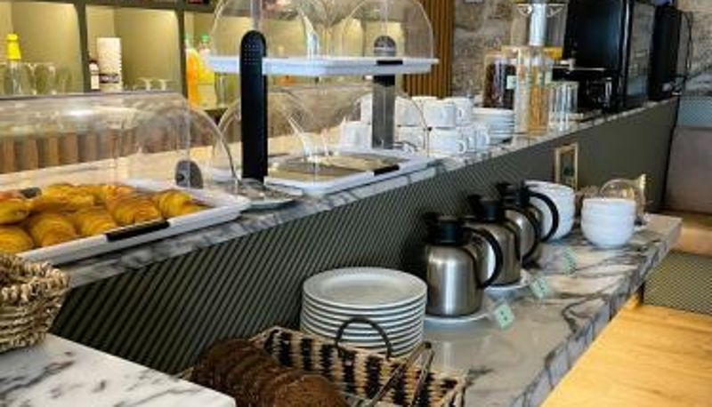 Sala de desayunos dentro del restaurante - Hotel Quinta da Tulha By VimaHotels