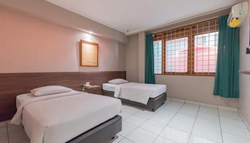Oda - Hotel Yehezkiel Surapati Mitra RedDoorz