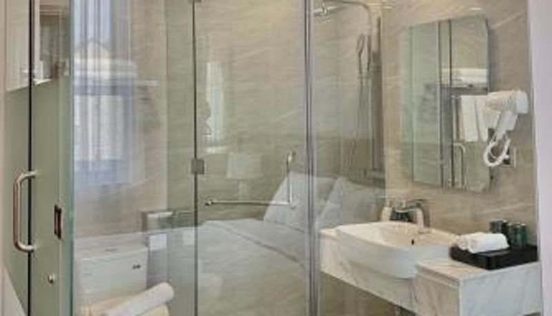 Badezimmer - Mansion Park Hotel & Apartment