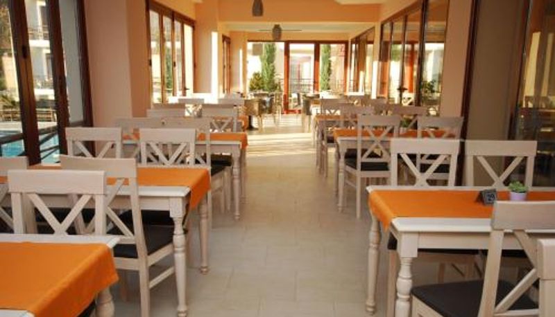 Frühstücksraum innerhalb des Restaurants - 4 Epoxes Hotel Spa