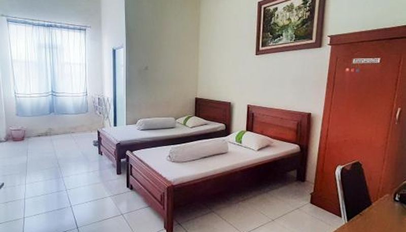 Pokój - RedDoorz Syariah At Penginapan Sederhana Palembang