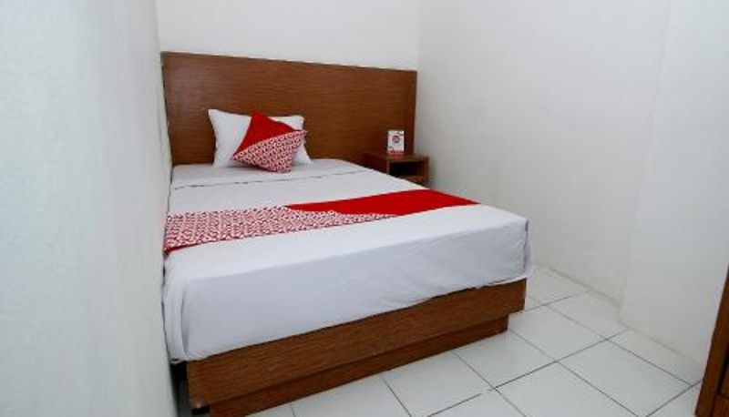 Room - Super OYO 1678 Jati Exclusive Homestay
