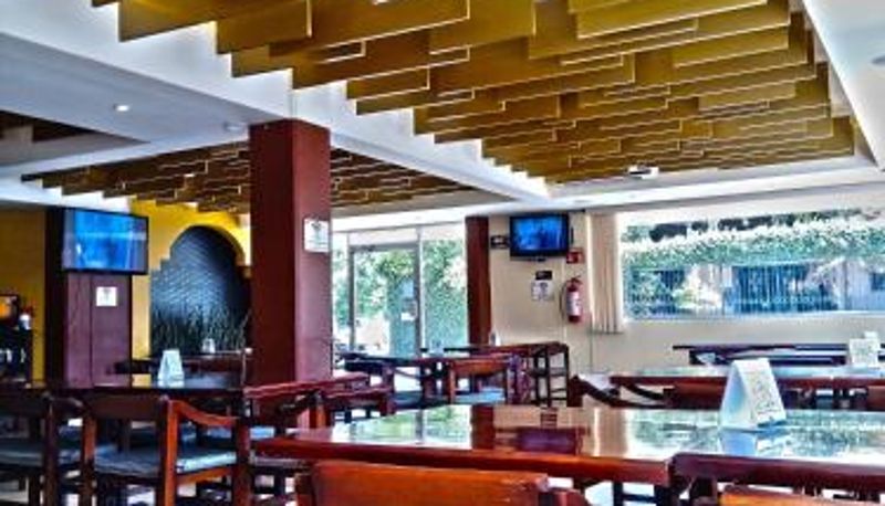 Frühstücksraum innerhalb des Restaurants - Villa Esmeralda