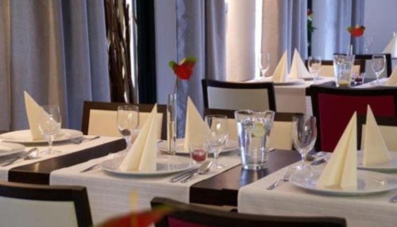 Frühstücksraum innerhalb des Restaurants - F - Team Hotel