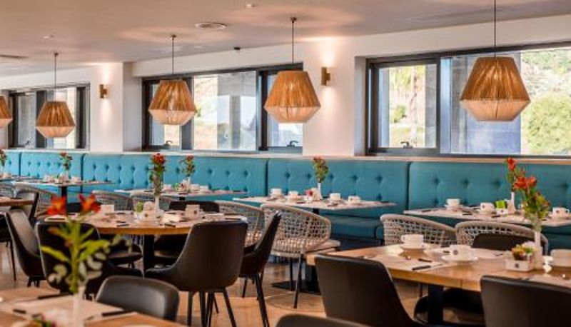 Ontbijtzaal in het restaurant - Magdala Hotel