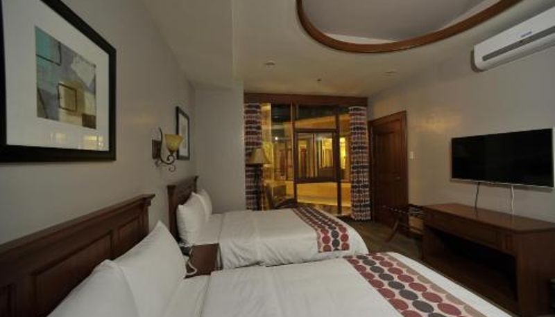 Habitación - Paragon Hotel and Suites
