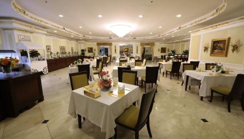 Salle de petit-déjeuner dans le restaurant - Al Khobar Habitat All Suites