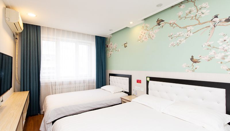 Zimmer - Yilai Mudanjiang Railway Station Hotel